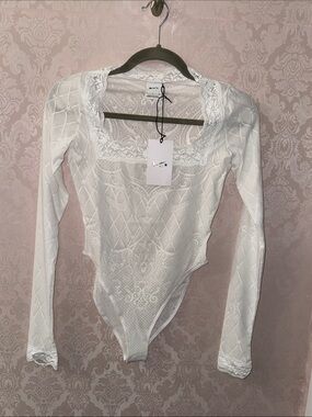 Nike White Lace-Detail Long Sleeve Bodysuit by Riccardo Tisci